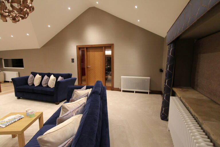 Curved Walnut Stairs & Feature Doors